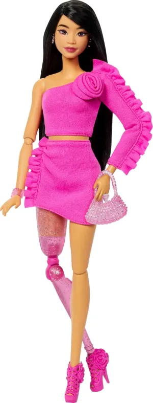 Barbie Deluxe Style Doll #2 in Barbiecore Outfit, Black Hair and Glittery Prosthetic Leg, Pink Top and Skirt Set with Rosette Detail and Accessories