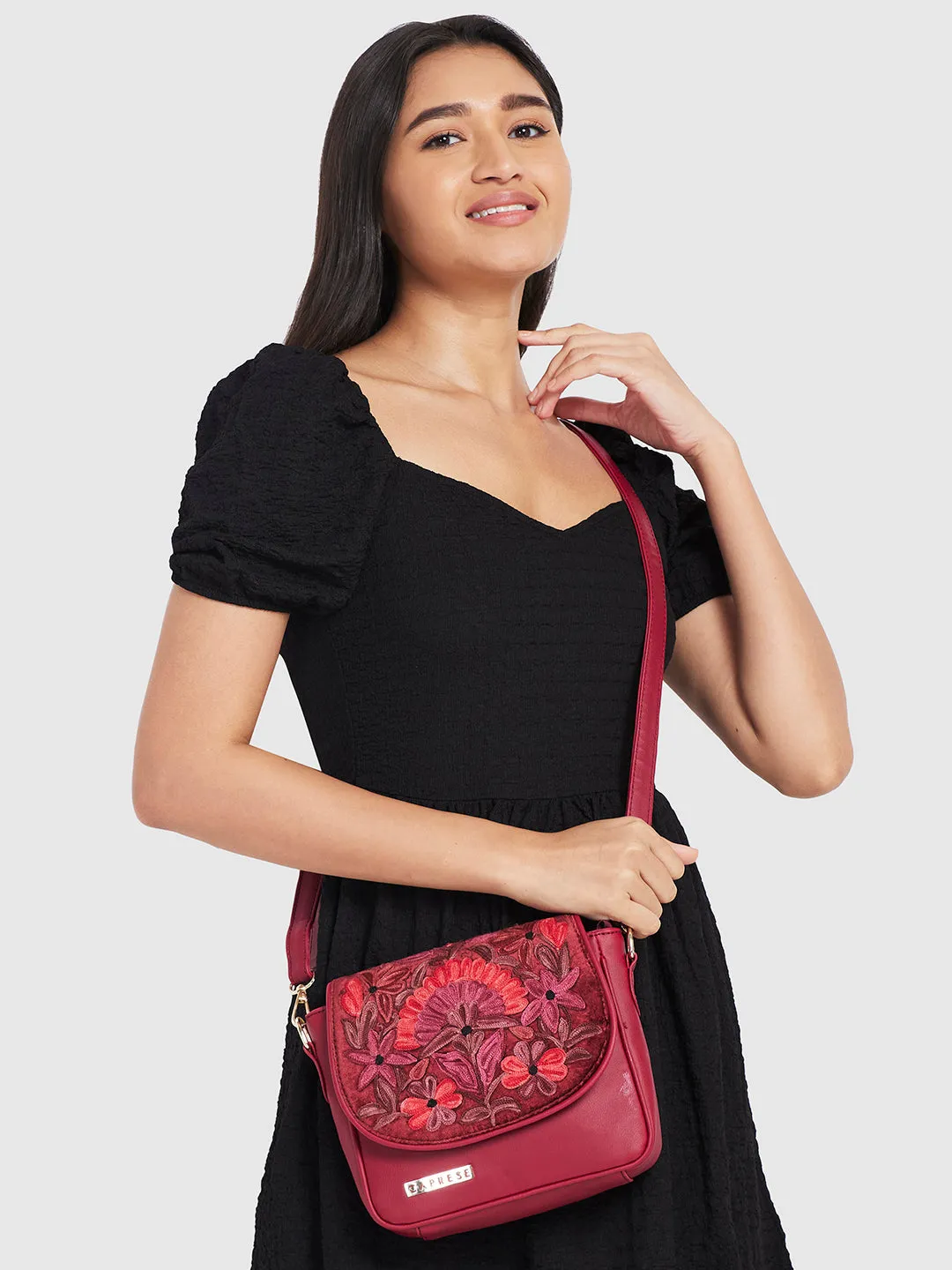 Caprese Tresna Large Maroon Sling Bag