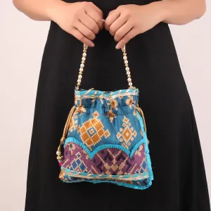 Glitter embellished Blue Ikat Print Potli