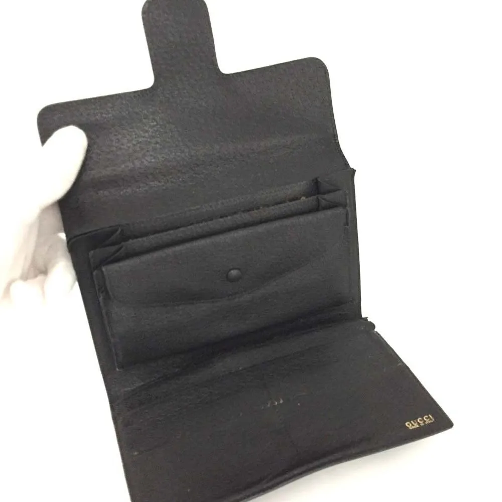 Unique, vintage, Gucci, RARE, black leather, clutch style purse or extra large wallet with a gold horse-bit accent at the clasp
