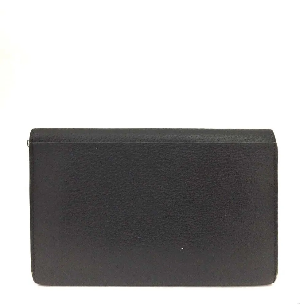 Unique, vintage, Gucci, RARE, black leather, clutch style purse or extra large wallet with a gold horse-bit accent at the clasp